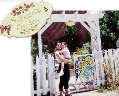 Rebecca and Charlotte at garden's butterfly gate entrance.
